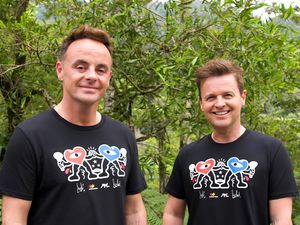 Ant and Dec posing in limited edition charity T-shirts