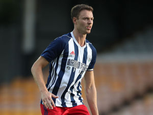 Supporting image for story: West Brom captain Jonny Evans hasn't travelled to Burnley with team
