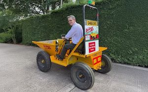 Martyn Richardson on his trusty dumper truck which he's driving through Ireland on a charity challenge dubbed The Dumper Run