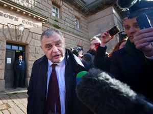 Mike Amesbury leaves Chester Crown Court after he had his 10-week prison sentence for assault suspended for two years