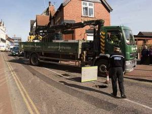 Supporting image for story: Collapsed sewer behind Market Drayton pothole
