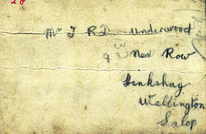 The name and address on the back of the soldier's photo.