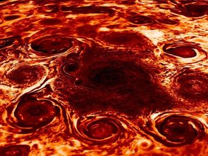 Supporting image for story: Nasa’s Juno spacecraft reveals massive cyclones raging on Jupiter