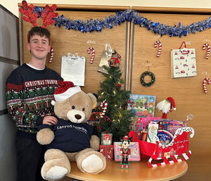 Cameron Petch, apprentice solicitor at Lanyon Bowdler with the Little Stars Christmas collection