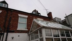 The Labrador had to be rescued after getting stuck on the roof of a home in Telford. Credit: @SFRS_Control