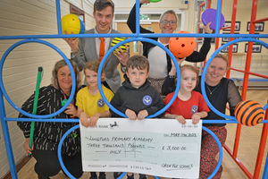 Longford Primary Academy in Cannock came second in our Cash for Schools competition. Pictured: admin officer Michelle Davis and headteacher Louise Lawrence with sponsors and pupils.