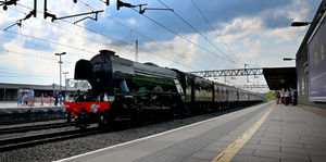 The Flying Scotsman makes its way past Stafford Station.