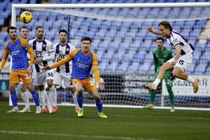 Josh Ruffels of Shrewsbury Town and Ryan Glover of Barnet during the game between Shrewsbury Town and Barnet