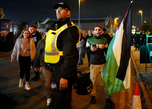 A pro-Palestine supporter holding a flag outside Villa Park, home of Aston Villa, before the UEFA Europa League match at Villa Park, Birmingham. Photo: Jacob King/PA Wire