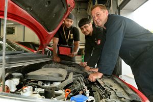 Automotive students at the City of Wolverhampton's Bilston campus have been raising money for charity by giving their lecturers' and visitors' cars a winter check over.
Students: James Kennan-Hannon and Akash Bhatia,with Automotive Lecturer Tyram Senior.