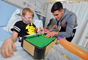 Corey Beecham from Beechdale, 6 , with Jordan Sangha