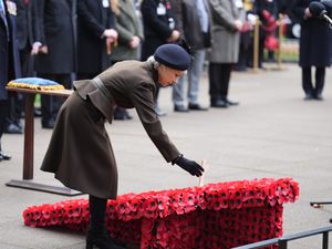 The Duchess of Gloucester lays a Remembrance cross during a visit to the Field of Remembrance, at Westminster Abbey in London, ahead of Armistice Day.