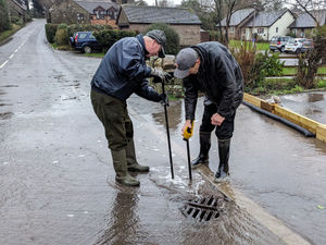 Supporting image for story: 'Fed up of doing the council's job for them!' Flood-hit villagers hit out over blocked drains
