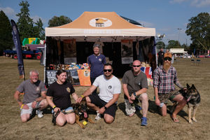 Hero Paws, the charity which helps service dogs to retire to their forever homes, was at the show raising awareness and money. Left to right Dave Beck, Sam Jones with Hogan, standing Deborah MCmahon, Dave Maltby, Danny Blanchard and Kieron Hawkes with Irsula. Image by Andy Compton