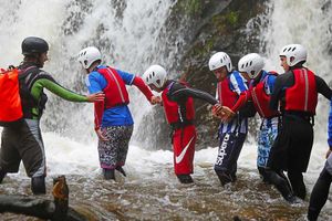 The teenagers take part in outdoor team-building exercises
