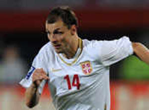 Birmingham manager Alex McLeish believes the promising chase of Standard Liege striker Milan Jovanovic is a sign the club will punch above their weight in the transfer market.