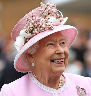Her Majesty wore her favoured colour of deep pink