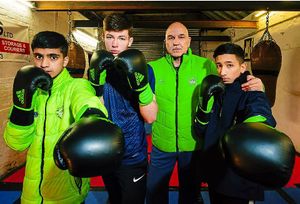 Head coach Mo Fiaz with other youngsters from the Wellington Boxing Club