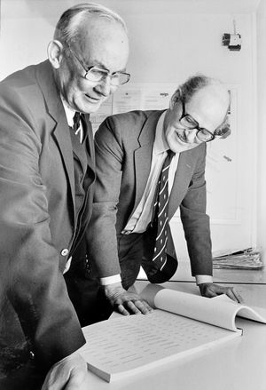 Reg Millward, left, and Lt Col Boxall with the completed roll of honour in February 1982.