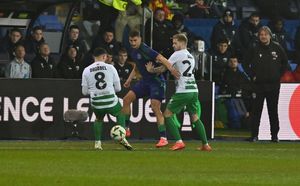 The New Saint's Ash Baker battles with The New Saint's Ben Clark closes down Panathinaikos' Filip Duricic