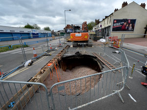 Supporting image for story: Repairs begin on Walsall sinkhole as frame installed to protect workers