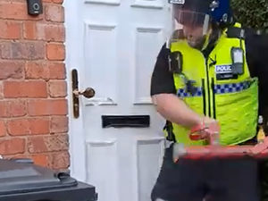 Supporting image for story: Watch as police 'bash down' a door in Dudley to unveiled a huge cannabis grow operation