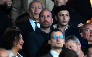 The Prince of Wales in the stands during the UEFA Champions League quarter final, first leg match at the Parc des Princes in Paris