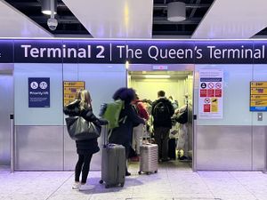 Passengers at Heathrow Terminal 2 in London after flights resumed