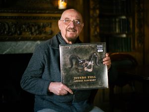 Jethro Tull’s Ian Anderson poses with a copy of his new album ‘Curious Ruminant’ at The Victoria Pub, Paddington, London