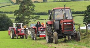 John Bates leading the procession of tractors