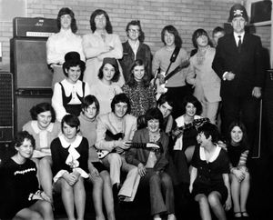 Pop groups The Skylons and Bird 'n' B's or Fluff (name changed to Fluff) at the Webb Youth Club, Dawley (later spelt as the Web Youth Club). This is from the memorabilia of Mrs Dawn Rice, nee Dawn Cullis. Dawn is front, centre with a big smile. Date guesstimate late 1960s. The Skylons were a Dawley group. Dawn hails originally from Dawley and was a girl drummer in Shropshire groups in the 1960s and into the 1970s. The groups included The Greasers from Dawley, The Pacifics from Newport, and then mainly Bird 'n' Bees, and then Fluff, and ultimately Dollymixcha and then Duplicate. Her husband Derek Rice whom she married in 1971 was a singer and guitarist in Walsall group The Saddlers. 