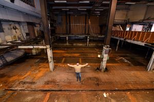 Managing Director Ben Anslow stands in the former huge press room.