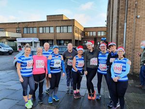 Supporting image for story: Dudley Kingswinford Running Club earned their Christmas puddings by pounding pavements