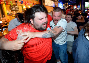 Fans celebrate England going 1-0 up at the Royal London pub, Wolverhampton