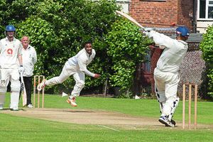 St George's Josh Fransman bangs in a short ball as he tries to make a breakthrough.