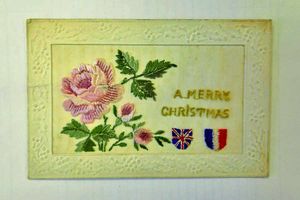 A Christmas card made in France includes the flags of both countries