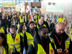 Striking workers marched at the Berlin-Brandenburg airport, Germany