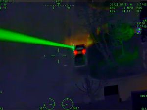 Supporting image for story: Watch: Man arrested after shining laser pointer at police helicopter