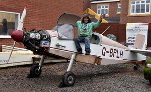 Neil Turner and his plane, which he has big plans for
