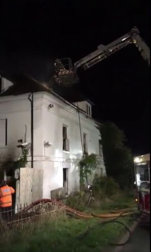 Firefighters tackle the fire at the derelict building.