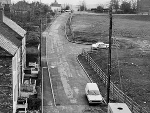 Oakengates - Beveley street scene on February 27, 1978. The picture was taken by Michael Hunt. The picture was used with the caption: 'Peace reigns at Beveley' which accompanied a story about the new Dawley to Donnington distributor road which told how the road building had caused disruption to the village but 'now residents are learning to live with the new way of life which has eliminated heavy traffic from their road which was used as a short cut to Oakengates from the A5 before the birth of the new road.'