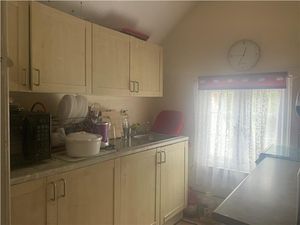 The kitchen upstairs. Photo: Halls Commercial