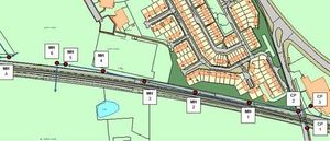 Highways gully system that includes several manhole chambers inside the railway fencing.