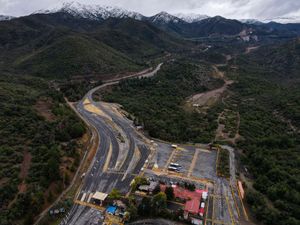 Supporting image for story: Rescue workers find body amid race to save people trapped in Chile copper mine