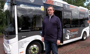 Councillor Rob Wilson with a Connect On-Demand bus. Picture: Shropshire Council.