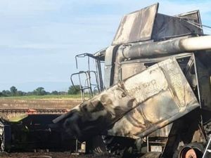 Supporting image for story: Farmers use tractors as fire break as blaze engulfs combine harvester near Market Drayton