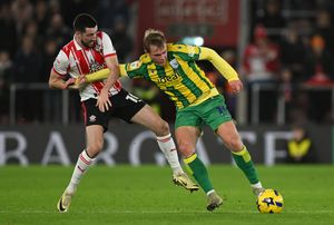 SOUTHAMPTON, ENGLAND - DECEMBER 09: Finn Azaz of Southampton challenges Aune Heggebo of West Bromwich Albion during the Sky Bet Championship match between Southampton and West Bromwich Albion at St Mary's Stadium on December 09, 2025 in Southampton, England. (Photo by Mike Hewitt/Getty Images)