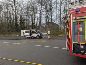 The van's engine compartment appeared to be badly damaged by fire