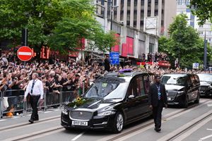 The funeral cortege of Black Sabbath frontman Ozzy Osbourne travels along Broad Street in Birmingham. (Jacob King/PA Wire)