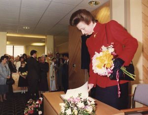 Princess Anne flicks through the visitors book after adding her signature at the official opening of the Telford Hospital on February 12, 1990. On her visit it became known as the Princess Royal Hospital, Telford
